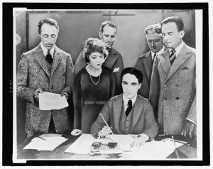 Pickford signing the UA Contract with her co-founders